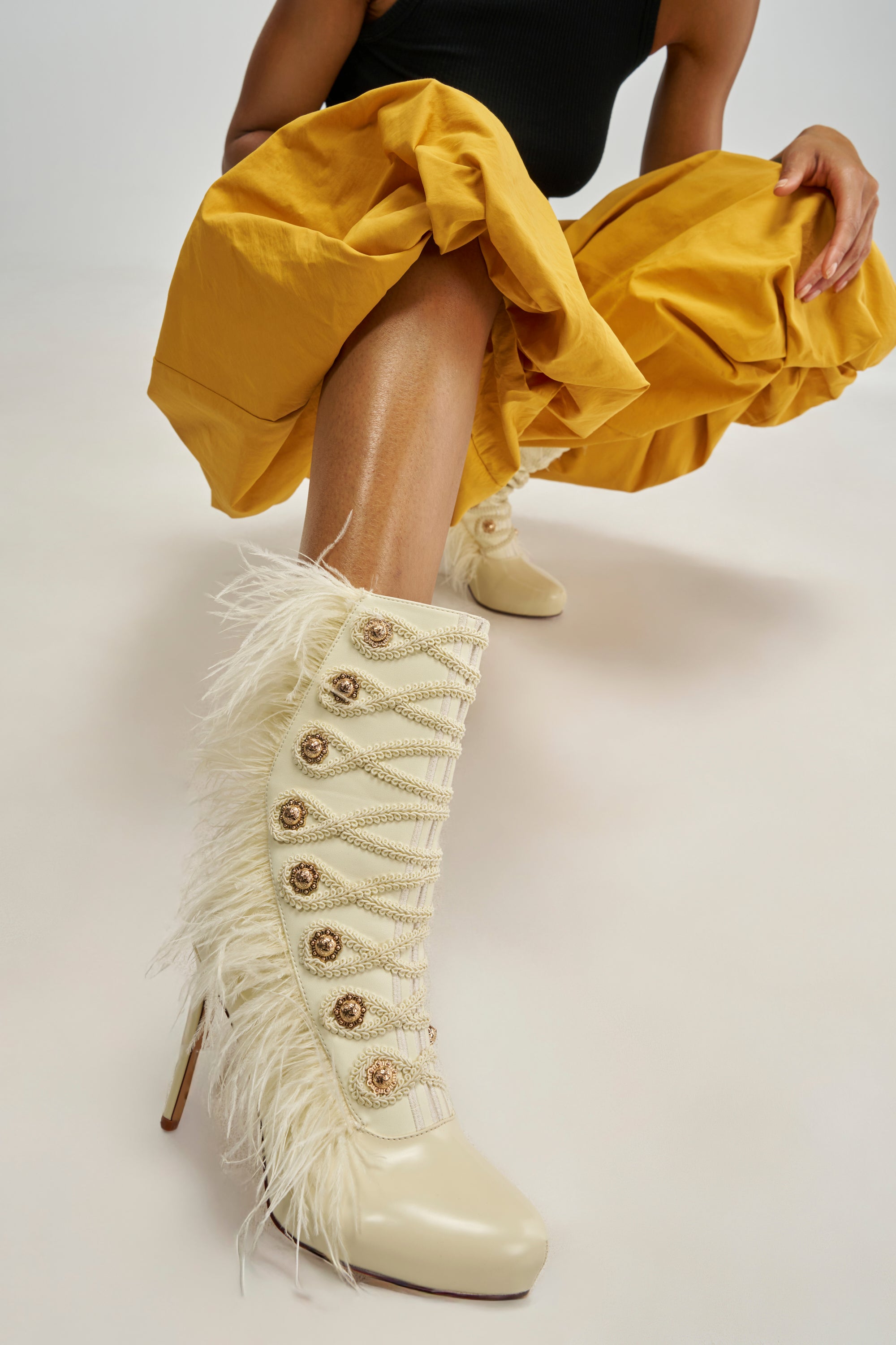 AZALEA WANG BANSHEE IVORY MILITARY AND FEATHER STILETTO BOOTIE