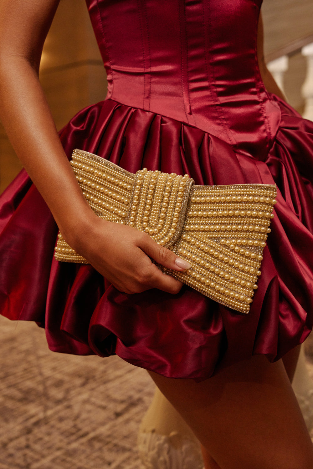 DRESSED TO IMPRESS PEARL BAG IN GOLD