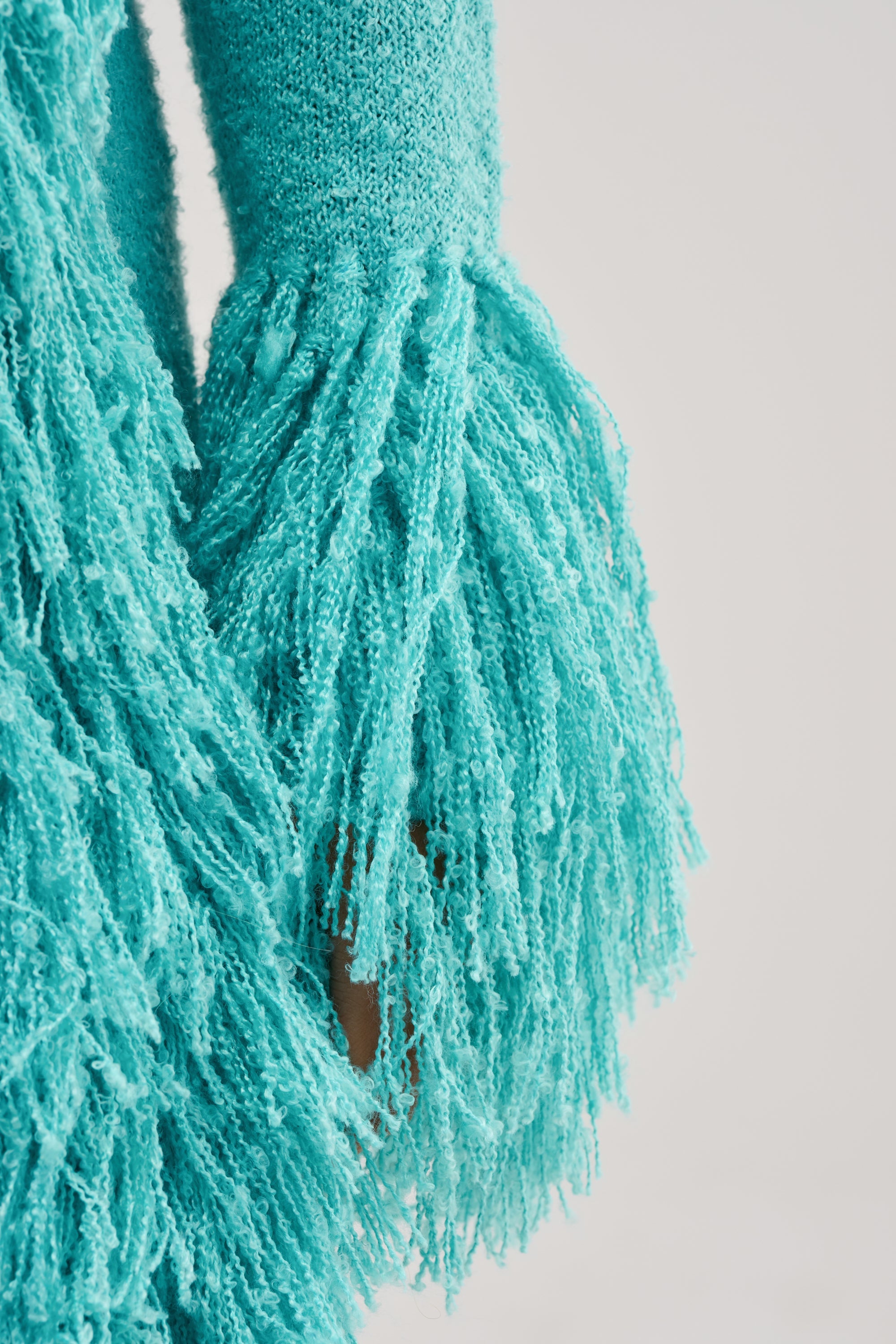 BURRR IT'S COLD OUTSIDE FRINGE OVERSIZED SWEATER IN TURQUOISE